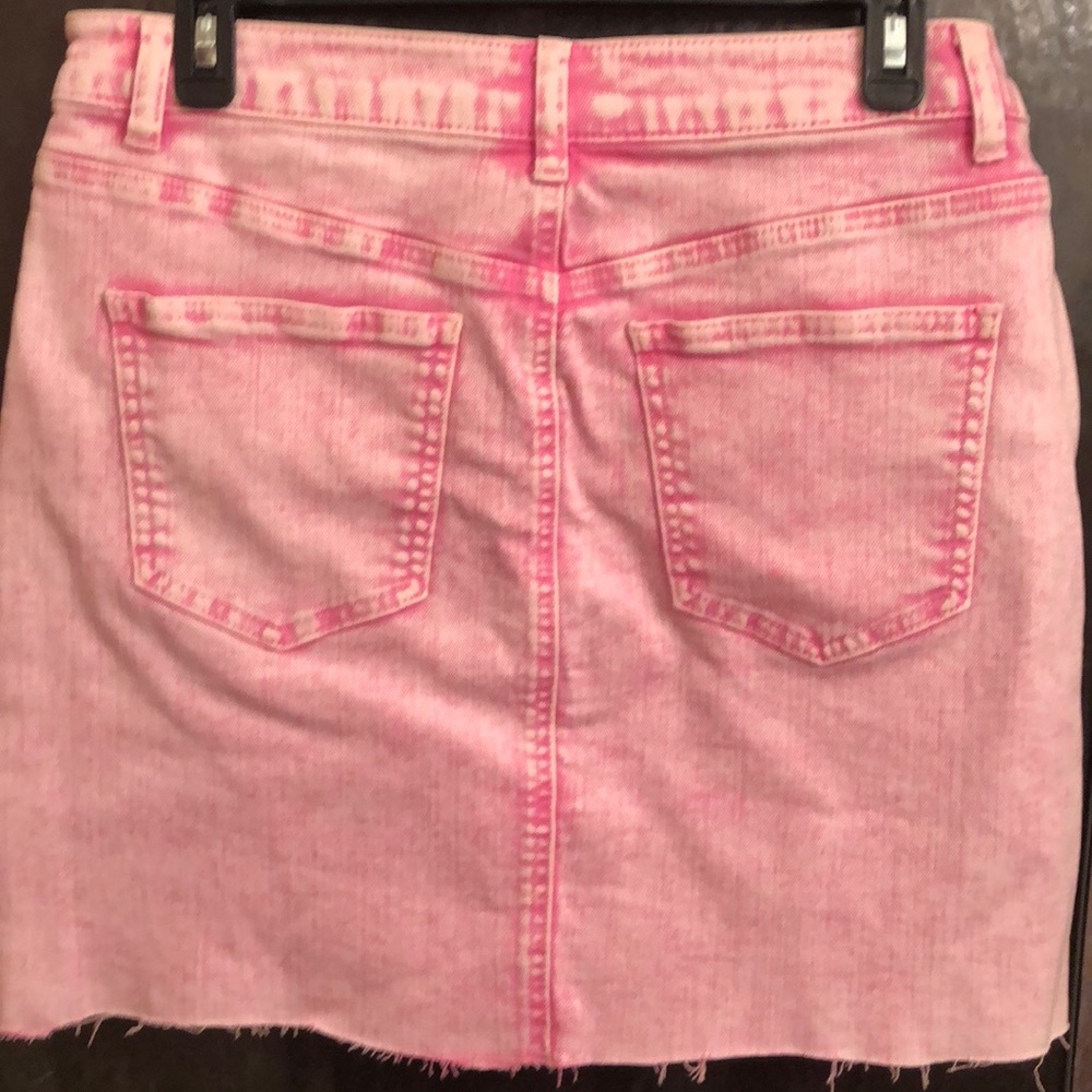 Short pink denim skirt